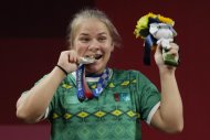 Fotoreport: Weightlifter Polina Guryeva from Turkmenistan won Olympic silver in Tokyo