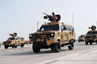 Military equipment passed in front of the State Tribune as part of the parade dedicated to the Independence Day of Turkmenistan