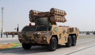 Military equipment passed in front of the State Tribune as part of the parade dedicated to the Independence Day of Turkmenistan