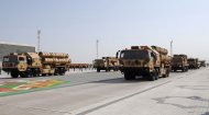 Military equipment passed in front of the State Tribune as part of the parade dedicated to the Independence Day of Turkmenistan